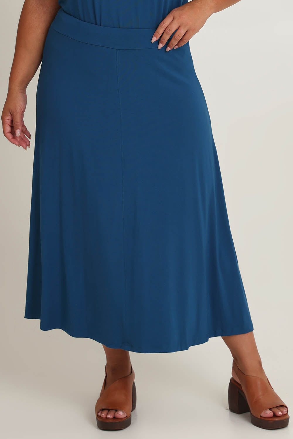 Model Ashleigh wearing size 16 of The Mix Me Match Me Bamboo Full Skirt in colour Marine (Blue), from the front, cropped image