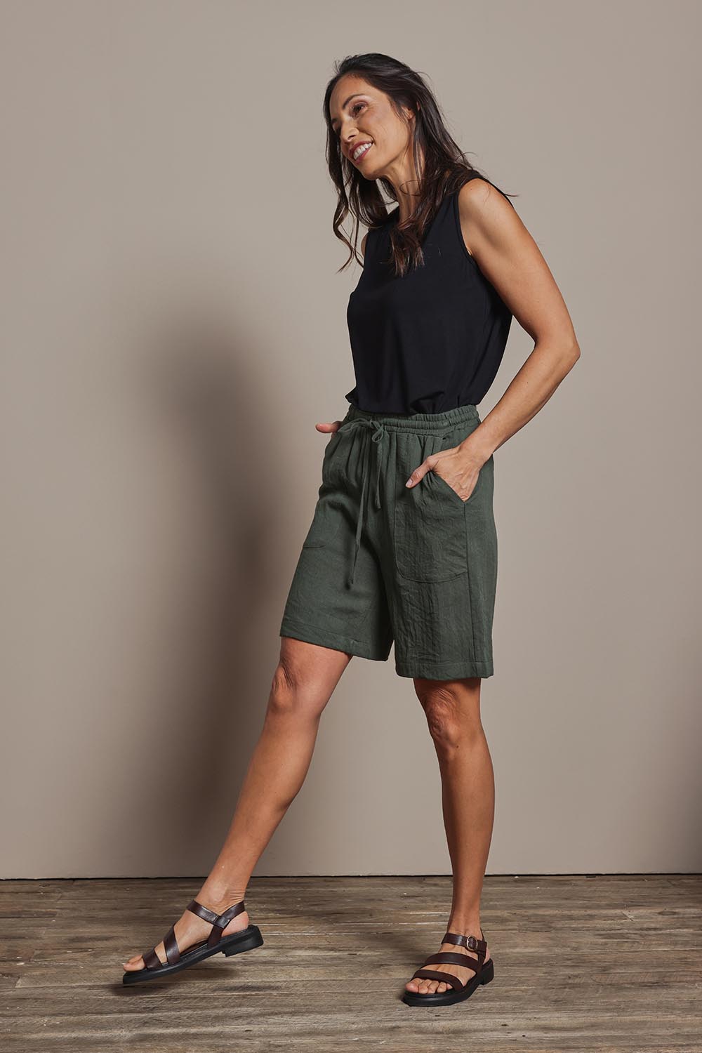 Model Amanda wearing size 10 of The Must Have Linen Look Pull On Shorts in colour Armygreen (Green), from the front, showing the whole outfit
