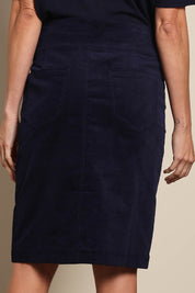Model Amandam wearing size 10 of the The Keepers Cord Pull On Skirt – Darknavy in colour Darknavy, from the back