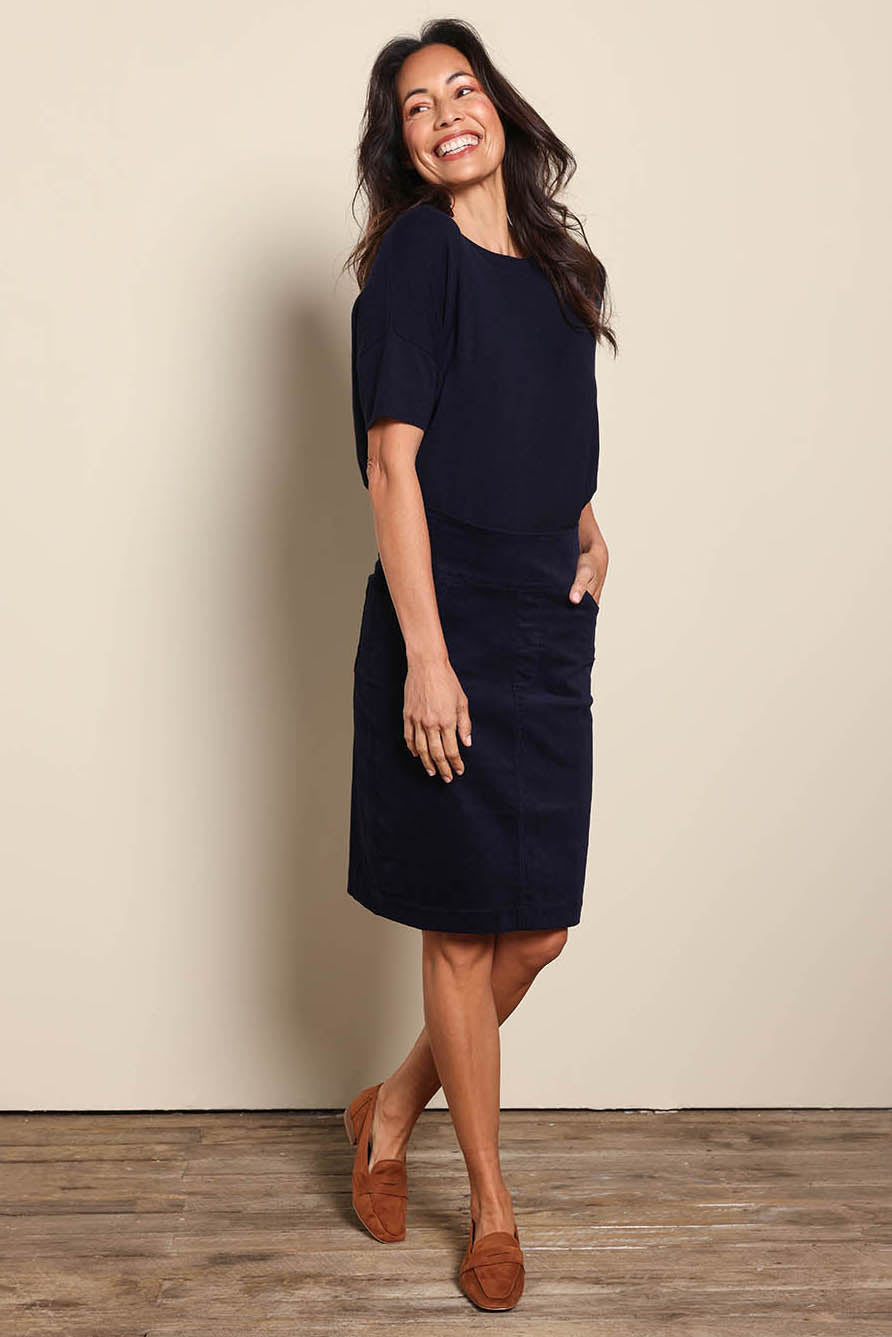 Model Amandam wearing size 10 of the The Keepers Cord Pull On Skirt – Darknavy in colour Darknavy, from the front