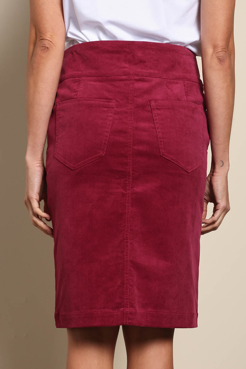 Model Amandam wearing size 10 of the The Keepers Cord Pull On Skirt – Dustyrose in colour Dustyrose, from the back