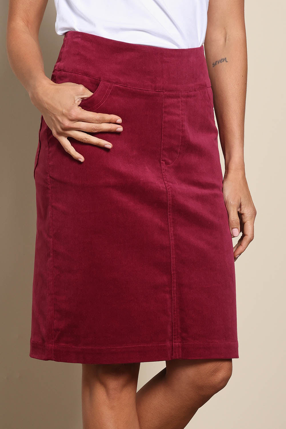 Model Amandam wearing size 10 of the The Keepers Cord Pull On Skirt – Dustyrose in colour Dustyrose, in a cropped view