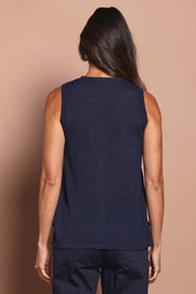 Model Amanda wearing size S of The Every Wear Knit Button Up Vest in colour Honorblue (Blue), from the back