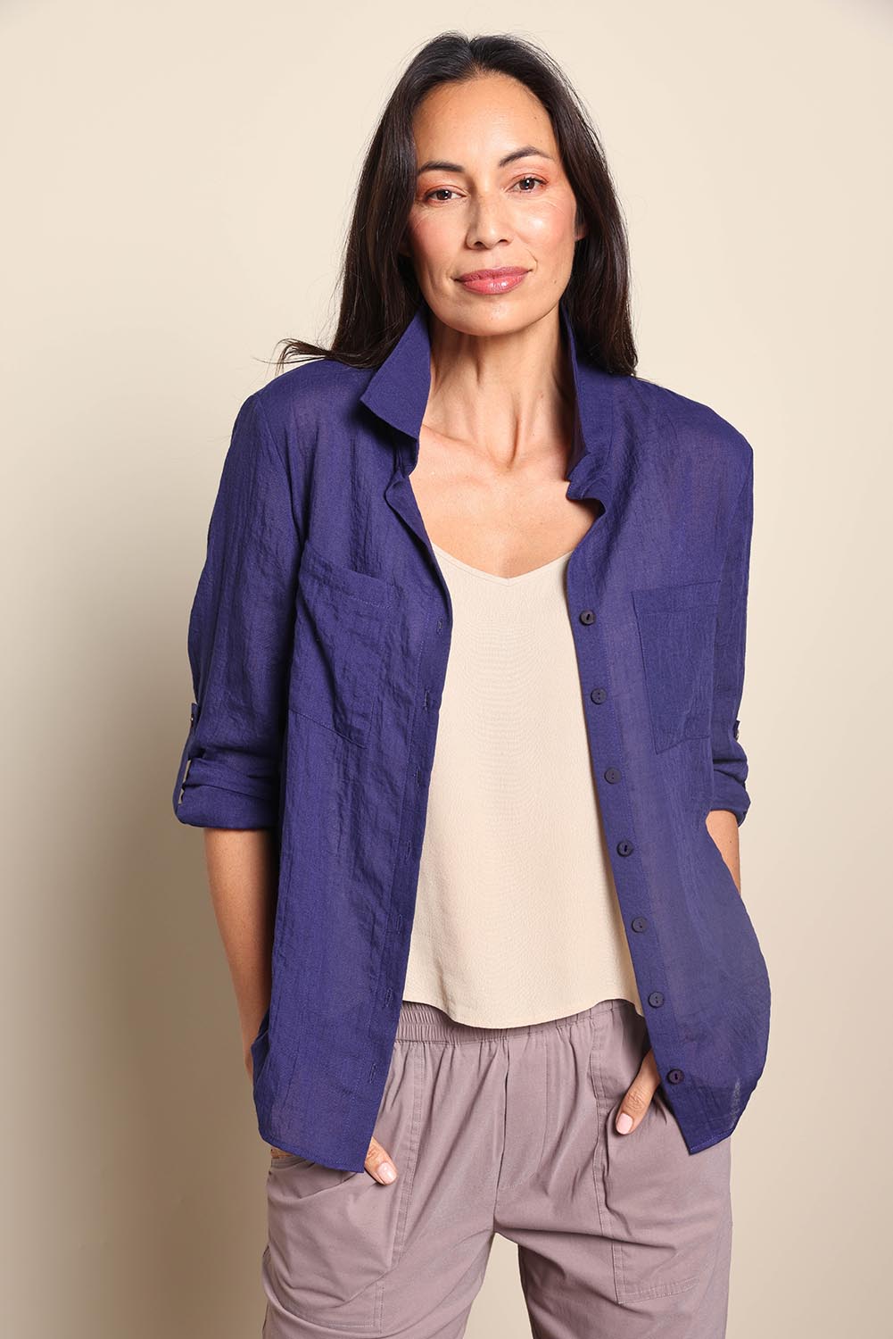 Model Amandam wearing size 10 of the The Go To Comfort Shirt - Navy in colour Navy, in a cropped view