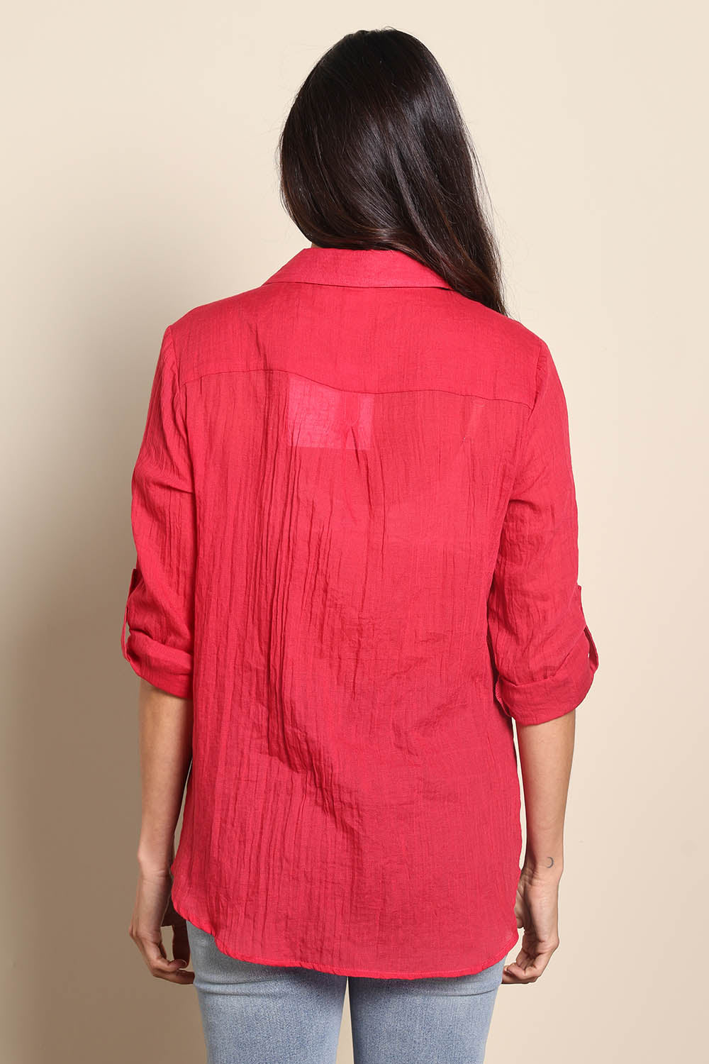 Model Amandam wearing size 10 of the The Go To Comfort Shirt - Raspberry in colour Raspberry, from the back