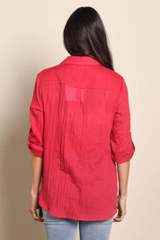 Model Amandam wearing size 10 of the The Go To Comfort Shirt - Raspberry in colour Raspberry, from the back