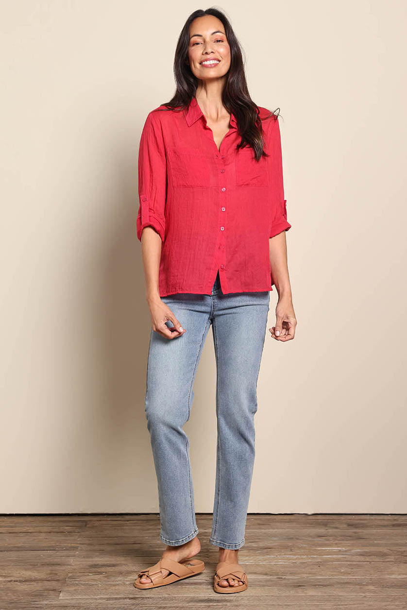 Model Amandam wearing size 10 of the The Go To Comfort Shirt - Raspberry in colour Raspberry, from the front