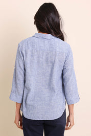 Model Amandam wearing size 10 of the The Easy Wear Shirt  - Navy in colour Navy, from the back
