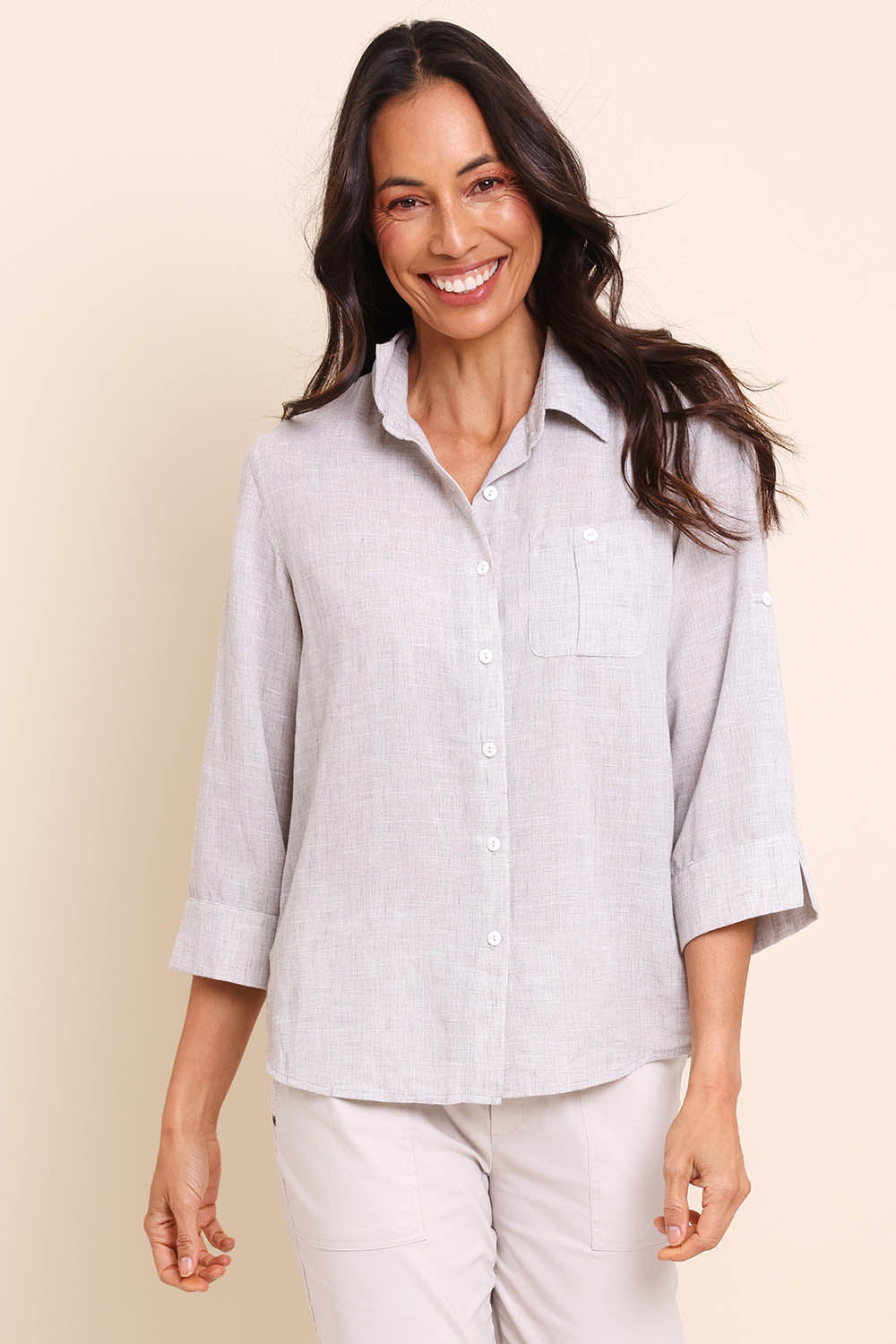 Model Amandam wearing size 10 of the The Easy Wear Shirt  - Oyster in colour Oyster, in a cropped view