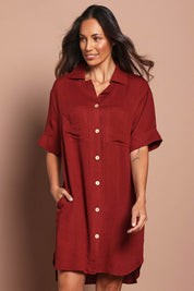 Model Amanda wearing size 10 of The Must Have Linen Look Shacket Dress in colour Sangria (Red), from the front, cropped image
