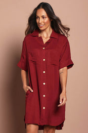 Model Amandam wearing size 10 of the The Must Have Linen Look Shacket Dress - Sangria in colour Sangria, in a cropped view