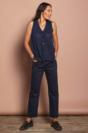Model Amanda wearing size 10 of The Teachers Cotton Pant With Pockets in colour Honorblue (Blue), from the front, showing the whole outfit