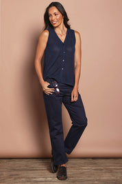 Model Natalie wearing size 10 of The Teachers Cotton Pant With Pockets in colour Honorblue (Blue), from the front, showing the whole outfit