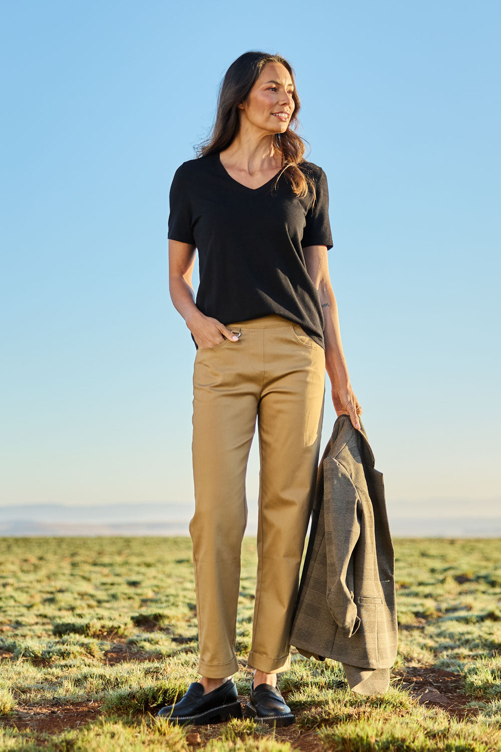 Model Amanda wearing size 10 of The Teachers Cotton Pant With Pockets in colour Sandstone, from the front, showing the whole outfit