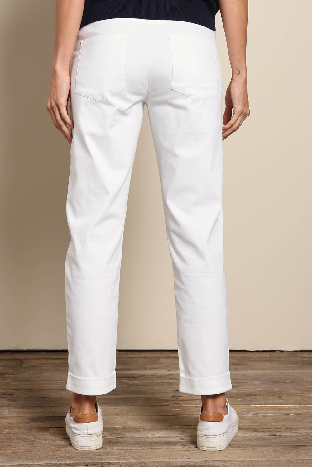Model Amandam wearing size 10 of the The Teachers Pant With Pockets – White in colour White, from the back