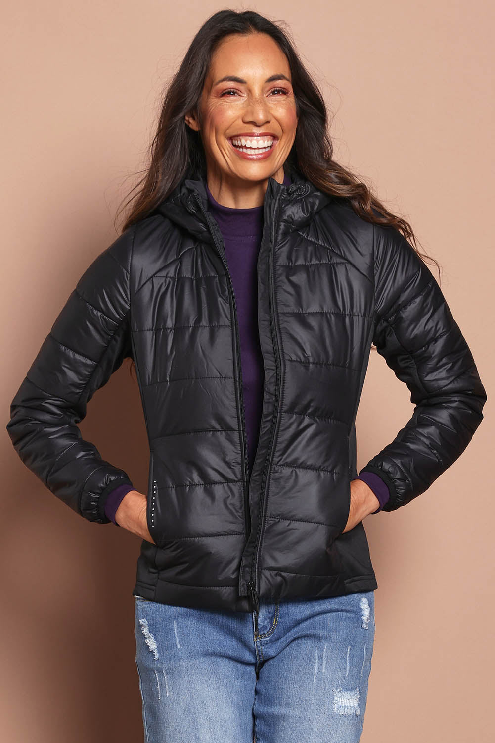 Model Amanda wearing size S of The Keepers Puffer Jacket in colour Black (Black), from the front, cropped image