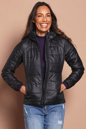 Model Amanda wearing size S of The Keepers Puffer Jacket in colour Black (Black), from the front, cropped image