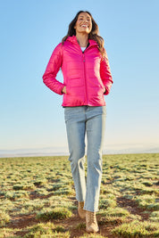 Model Amanda wearing size S of The Keepers Puffer Jacket in colour Hotpink (Pink), from the front, showing the whole outfit