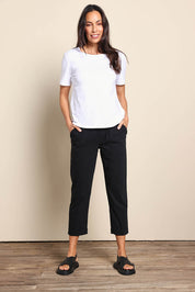 Model Amandam wearing size 10 of the The Cotton Pull On Stretch Comfort Pant – Black in colour Black, from the front