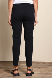 Model Amandam wearing size 10 of the The Cotton Pull On Stretch Comfort Pant – Black in colour Black, from the front
