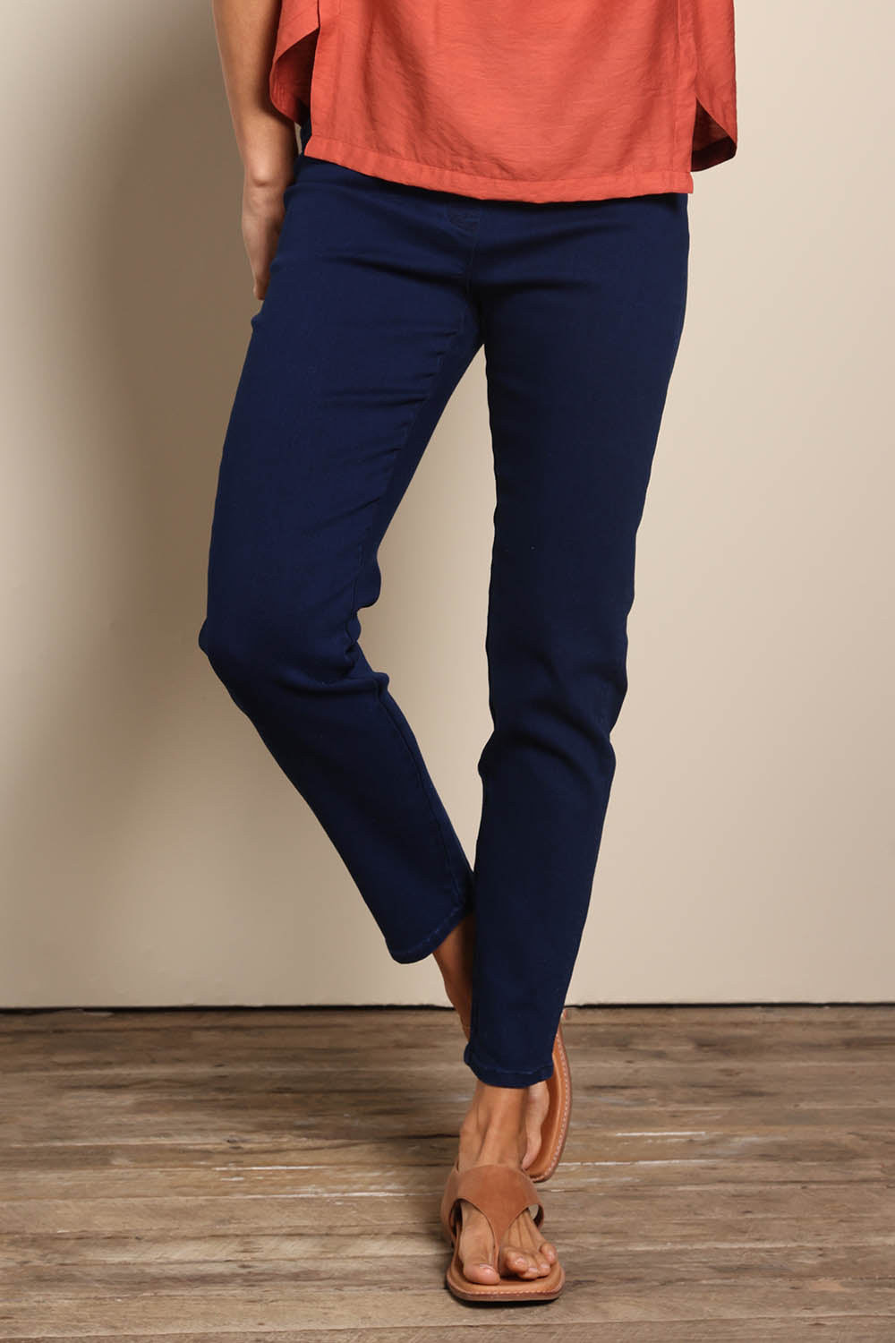 Model Amandam wearing size 10 of the The Cotton Pull On Stretch Comfort Pant – Indigo in colour Indigo, in a cropped view