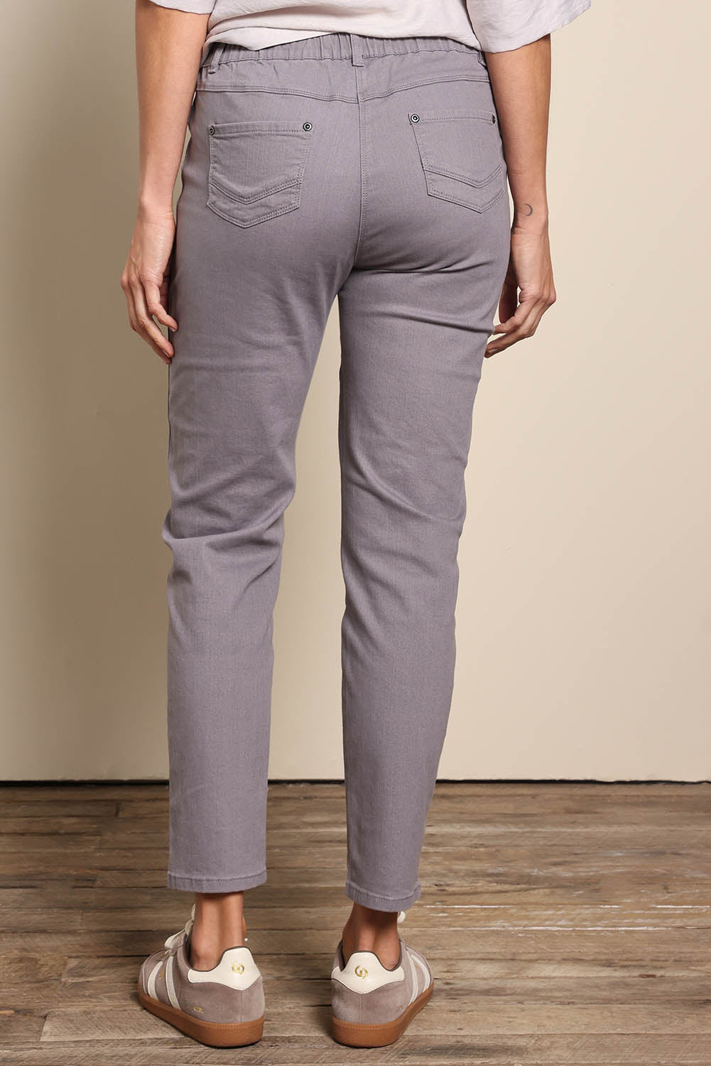 Model Amandam wearing size 10 of the The Cotton Pull On Stretch Comfort Pant – Latte in colour Latte, from the back