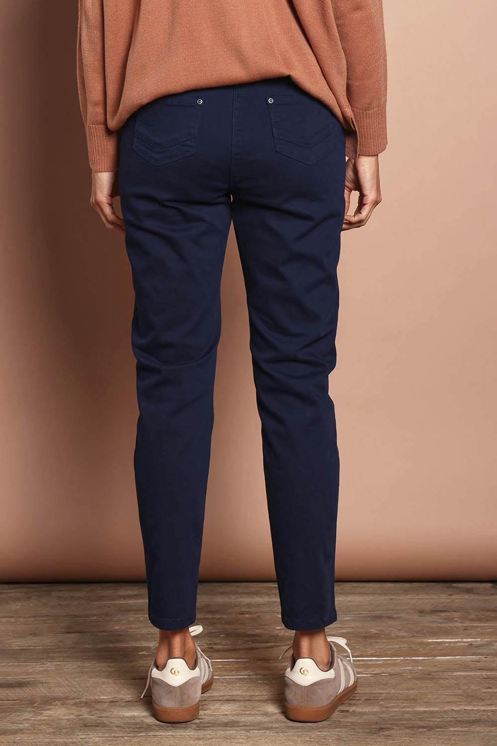 Model Amanda wearing size 10 of The Cotton Pull On Stretch Comfort Pant in colour Navy (Blue), from the back