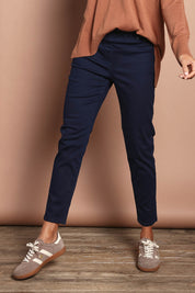Model Amanda wearing size 10 of The Cotton Pull On Stretch Comfort Pant in colour Navy (Blue), from the front, cropped image