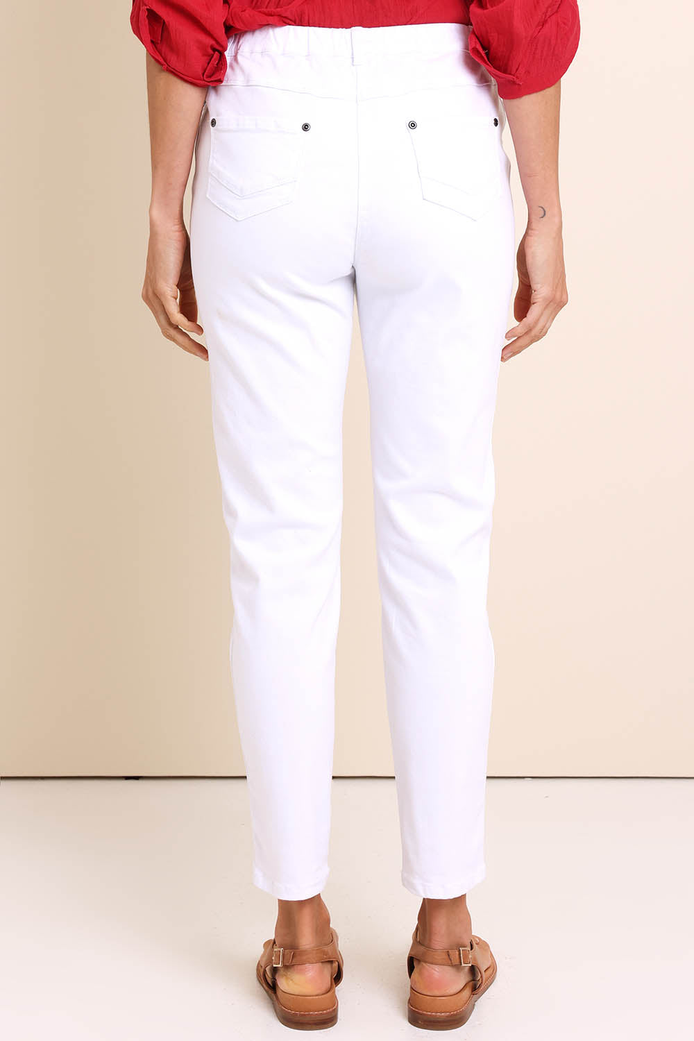 Model Amandam wearing size 10 of the The Cotton Pull On Stretch Comfort Pant – White in colour White, from the back