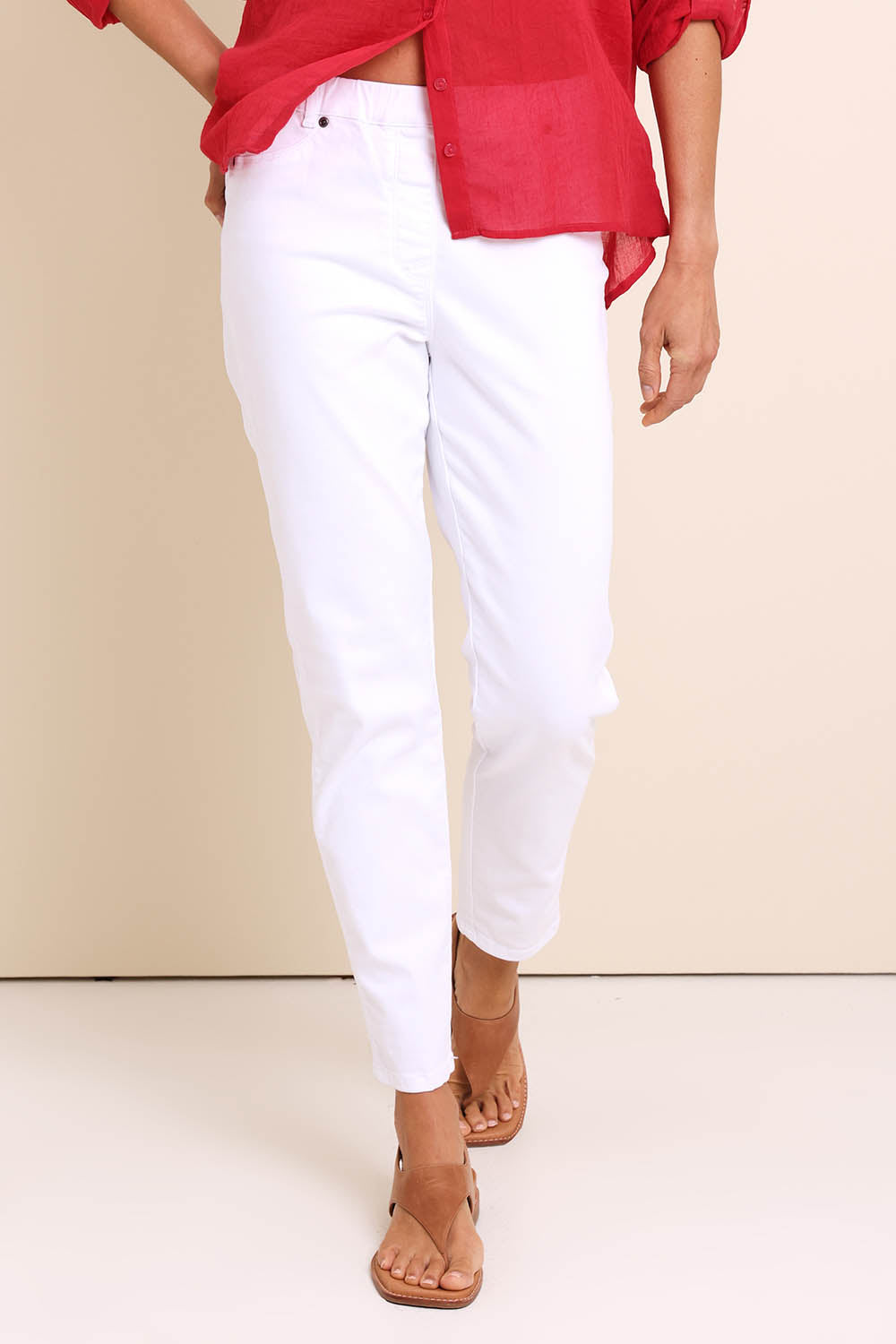 Model Amandam wearing size 10 of the The Cotton Pull On Stretch Comfort Pant – White in colour White, in a cropped view