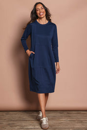 Model Amanda wearing size 10 of The Easy Wear Pocket Dress in colour Navy (Blue), from the front, showing the whole outfit
