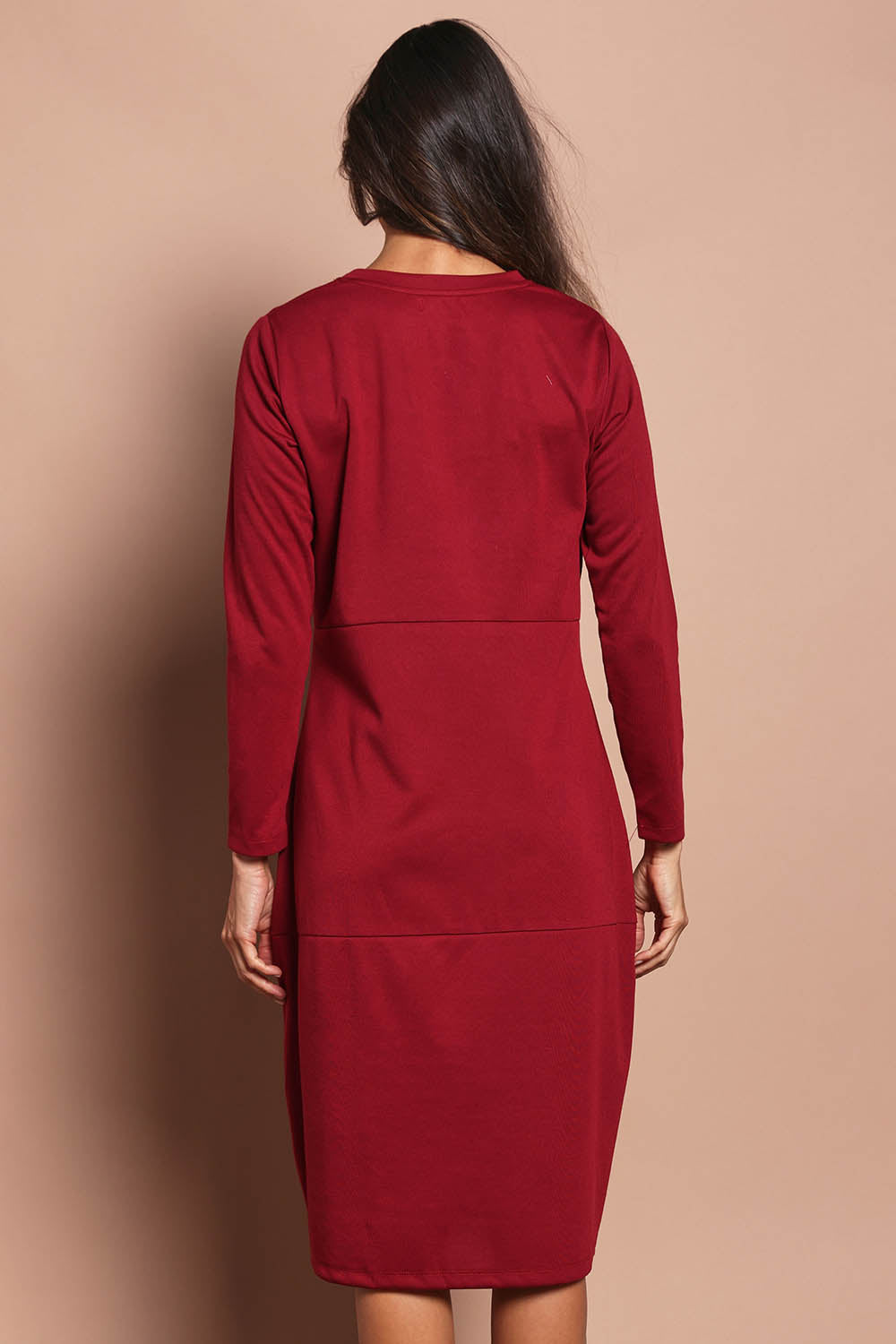 Model Amanda wearing size 10 of The Easy Wear Pocket Dress in colour Port (Red), from the back