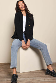 Model Amandam wearing size 10 of the The Classic Double Breasted Blazer – Black in colour Black, from the front