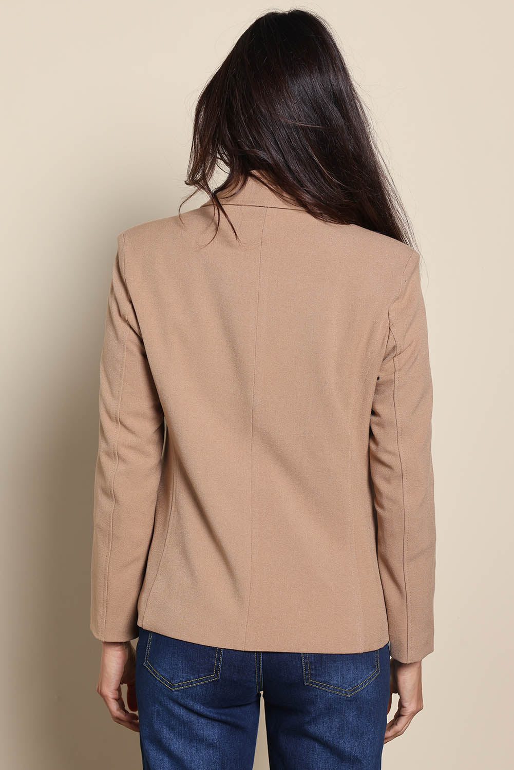 Model Amandam wearing size 10 of the The Classic Double Breasted Blazer – Tan in colour Tan, from the back