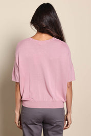 Model Amandam wearing size 10 of the The Essential Knit Tee – Blushcandy in colour Blushcandy, from the back