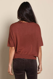 Model Amandam wearing size 10 of the The Essential Knit Tee – Copper in colour Copper, from the back