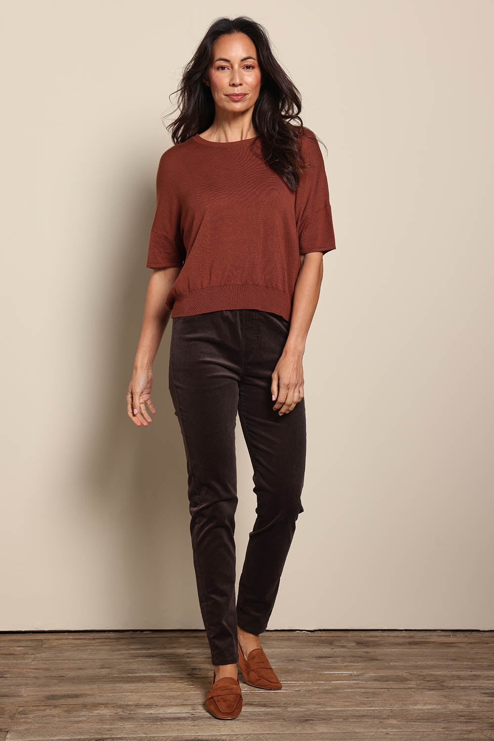 Model Amandam wearing size 10 of the The Essential Knit Tee – Copper in colour Copper, from the front