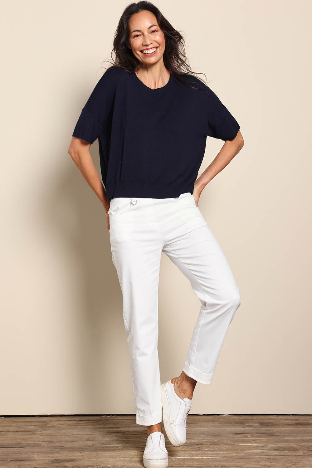 Model Amandam wearing size 10 of the The Essential Knit Tee – Darklapis in colour Darklapis, from the front