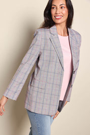Model Amandam wearing size 10 of the The Summer Check Blazer – Greypink in colour Greypink, from an angle