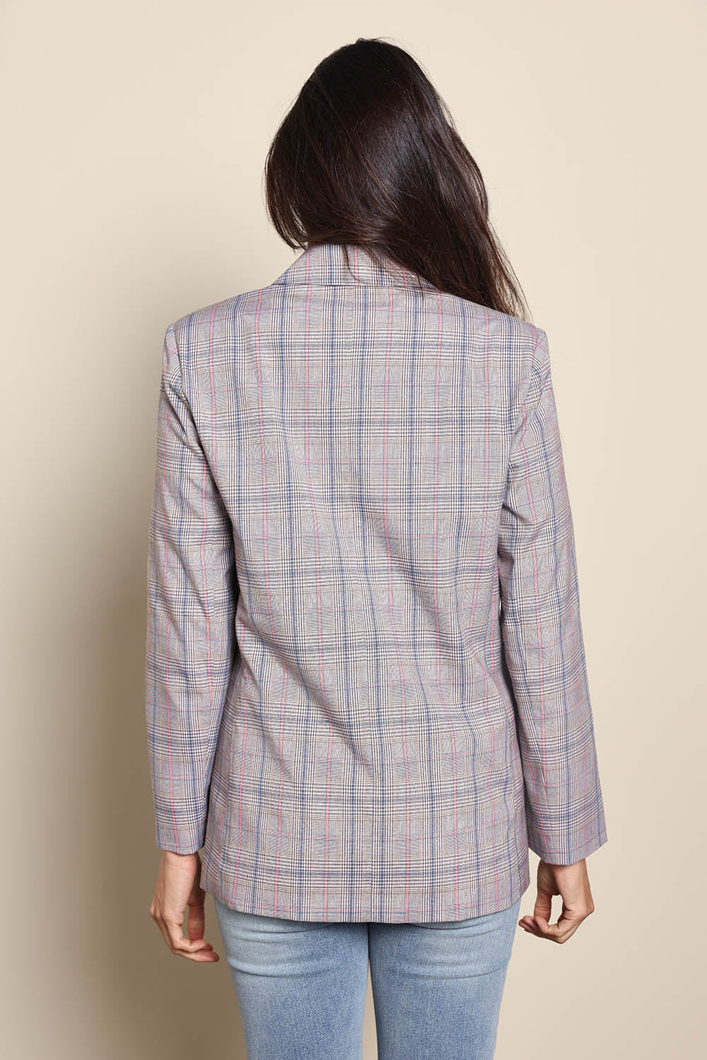 Model Amandam wearing size 10 of the The Summer Check Blazer – Greypink in colour Greypink, from the back