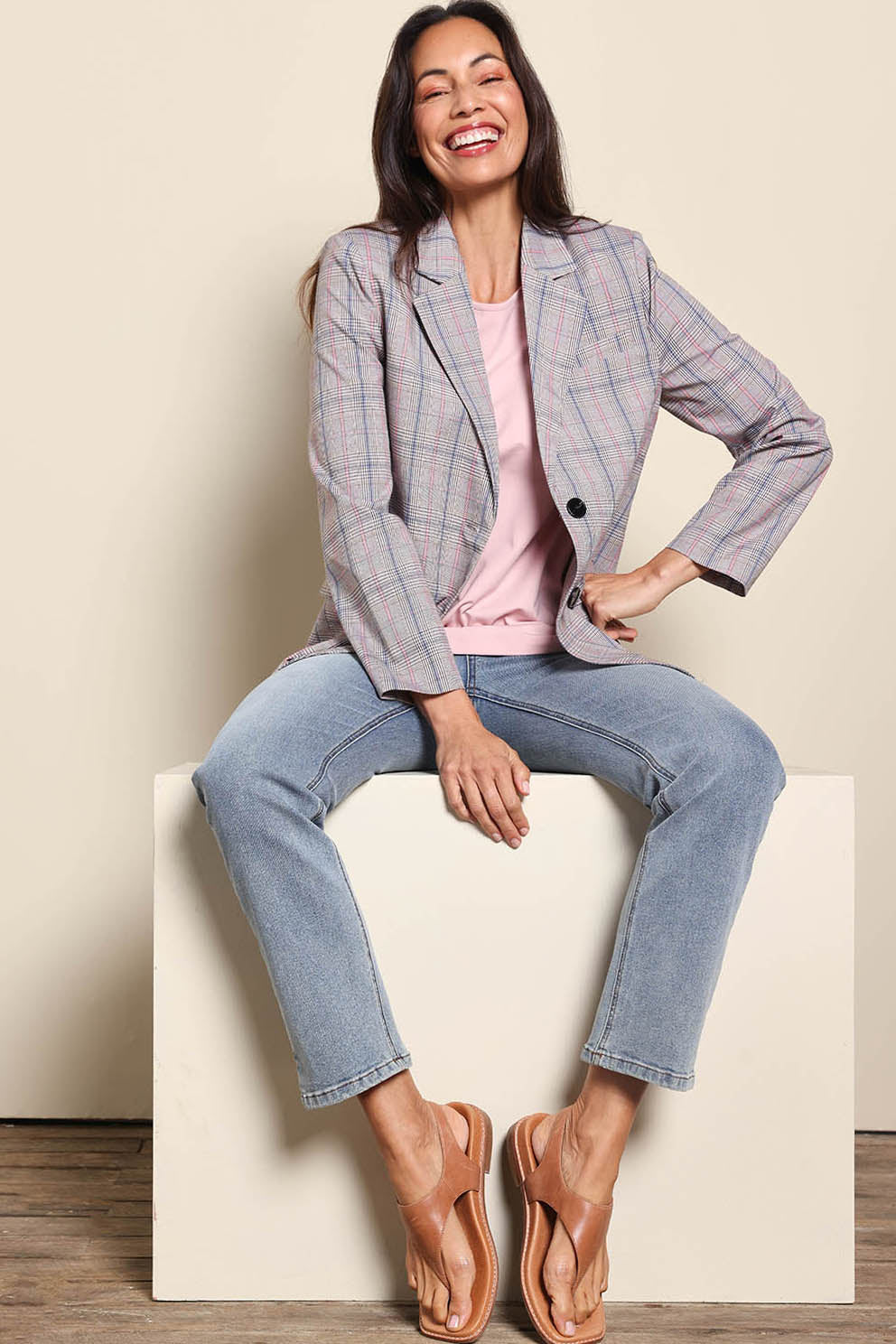 Model Amandam wearing size 10 of the The Summer Check Blazer – Greypink in colour Greypink, from the front