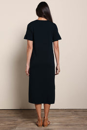 Model Amandam wearing size 10 of the The Summer Comfort True Knit Dress – Black in colour Black, from the front