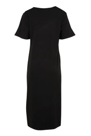 Product shot of the The Summer Comfort True Knit Dress – Black in colour Black, from the back