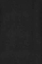 Product shot of the The Summer Comfort True Knit Dress – Black in colour Black, showing detail