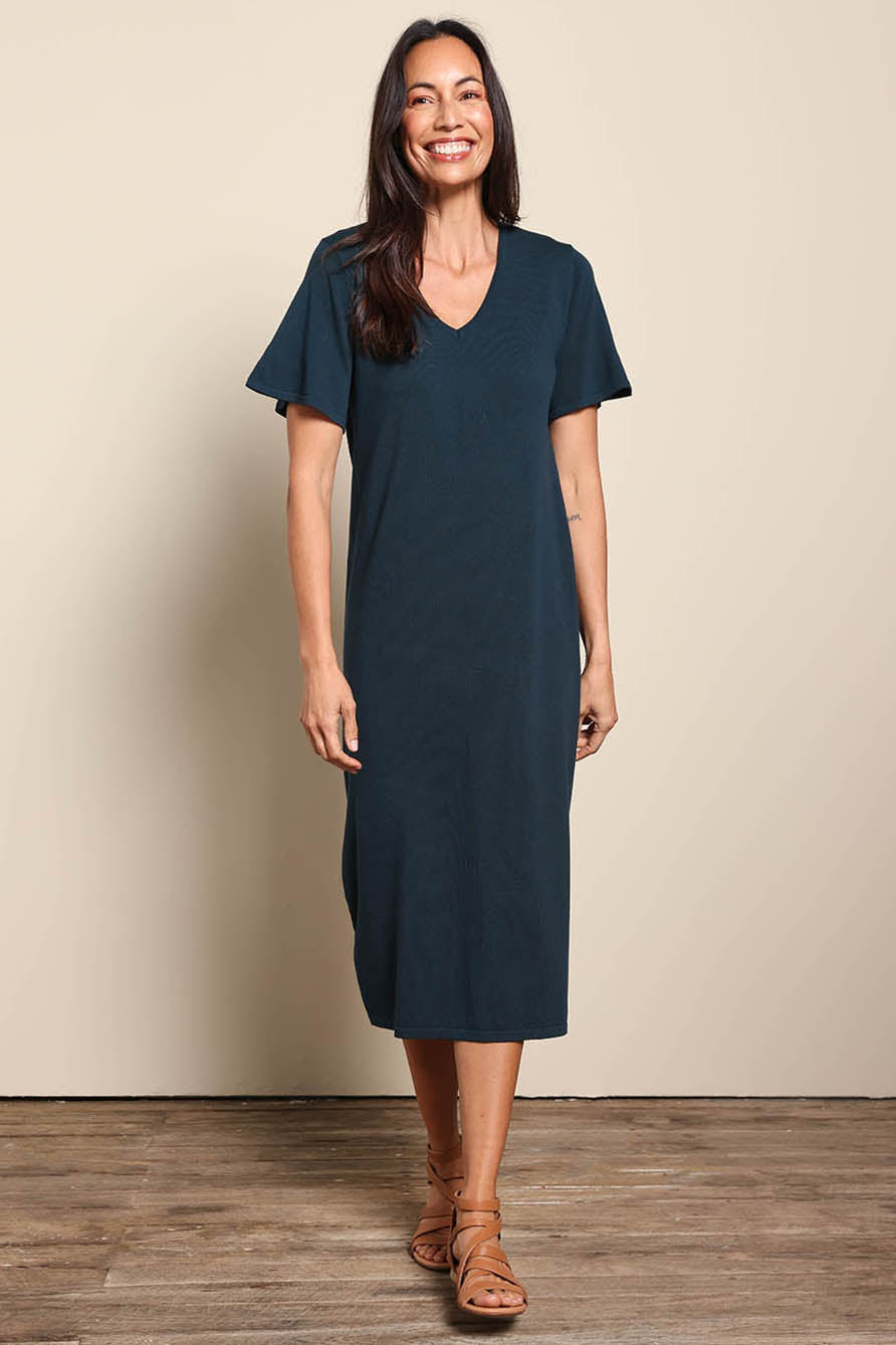 Model Amandam wearing size 10 of the The Summer Comfort True Knit Dress – Petrol in colour Petrol, from the front