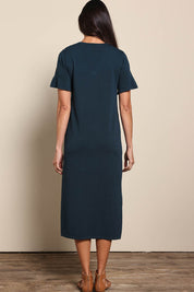Model Amandam wearing size 10 of the The Summer Comfort True Knit Dress – Petrol in colour Petrol, from the front