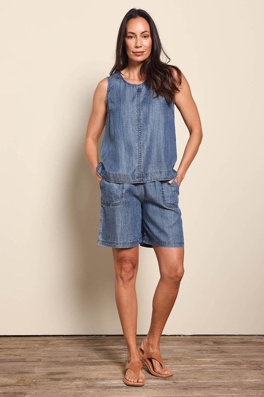 Model Amandam wearing size 10 of the The Luxe Lyocell Tank – Indigo in colour Indigo, from the front