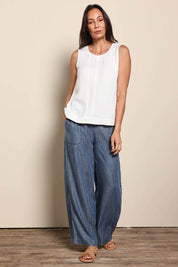 Model Amandam wearing size 10 of the The Luxe Lyocell Tank – Ivory in colour Ivory, from the front