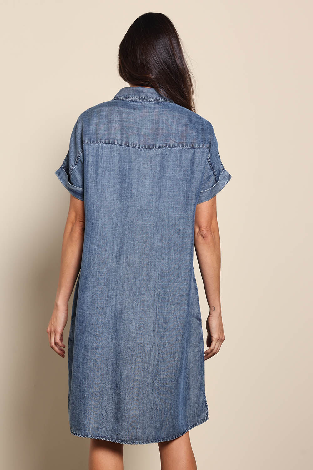 Model Amandam wearing size 10 of the The Luxe Lyocell Shacket Dress – Indigo in colour Indigo, from the back