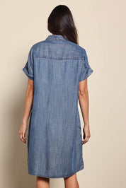 Model Amandam wearing size 10 of the The Luxe Lyocell Shacket Dress – Indigo in colour Indigo, from the back